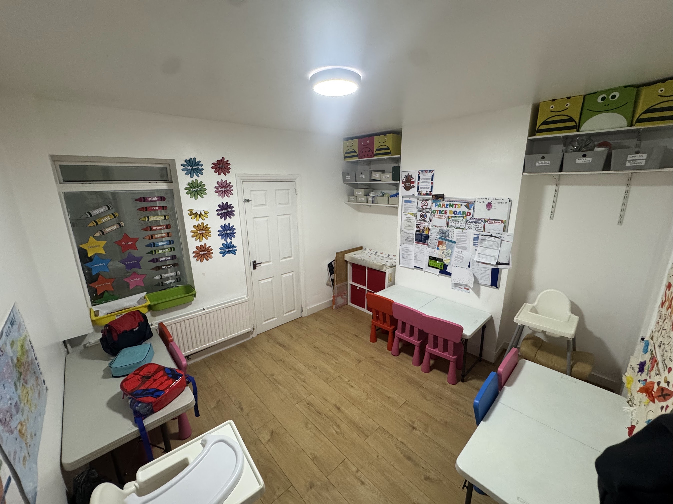 Croydon nursery room with child-sized tables and learning displays